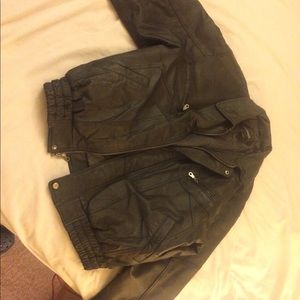 Cool brand-new black motorcycle jacket.